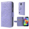 CUSTODIA FLIP ORIZZONTALE SIMILPELLE per SAMSUNG G900 GALAXY S5, S5 NEO CON PORTA CARTE FANTASIA FIORI CON STRASS VIOLA